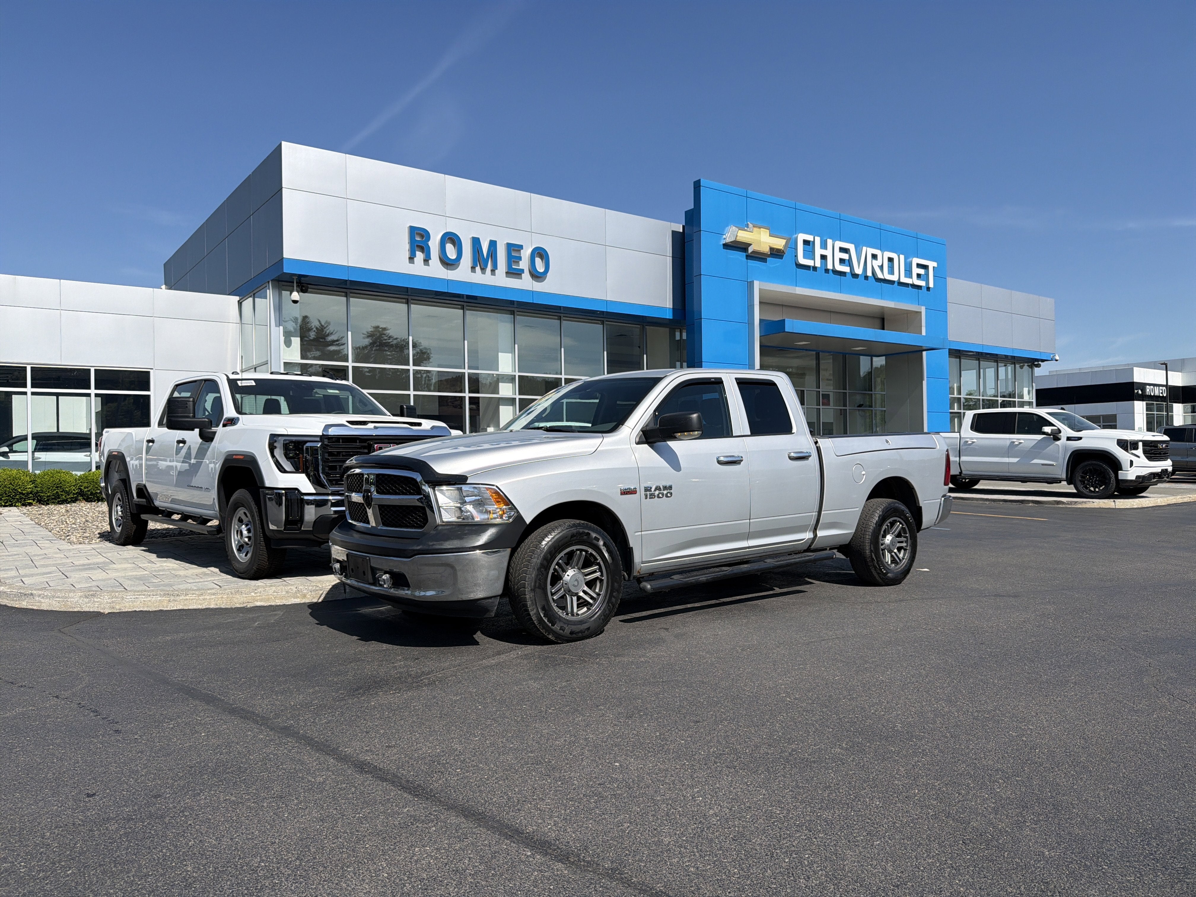 2018 RAM 1500 Tradesman Quad Cab 4x4 6'4" Box in Silver — front three-quarter view