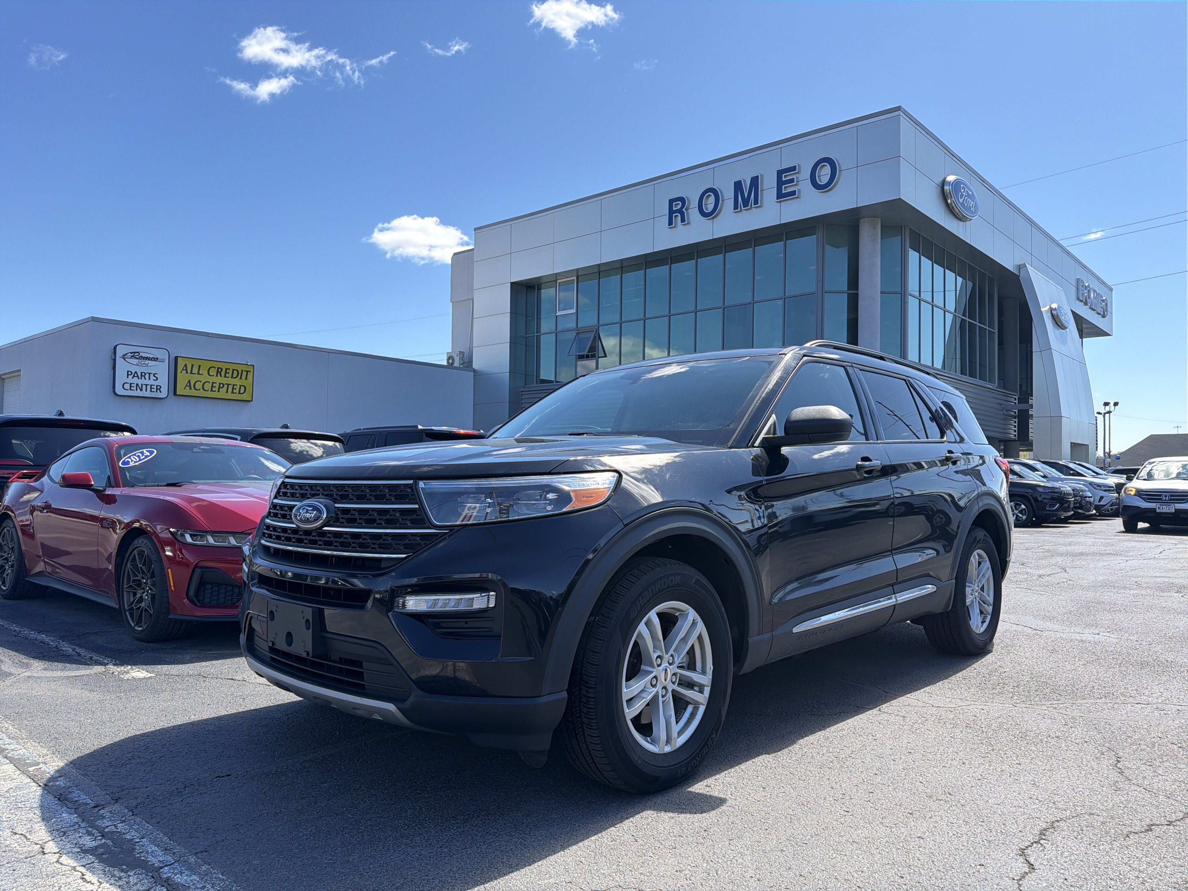 2021 Ford Explorer XLT in Black — front three-quarter view