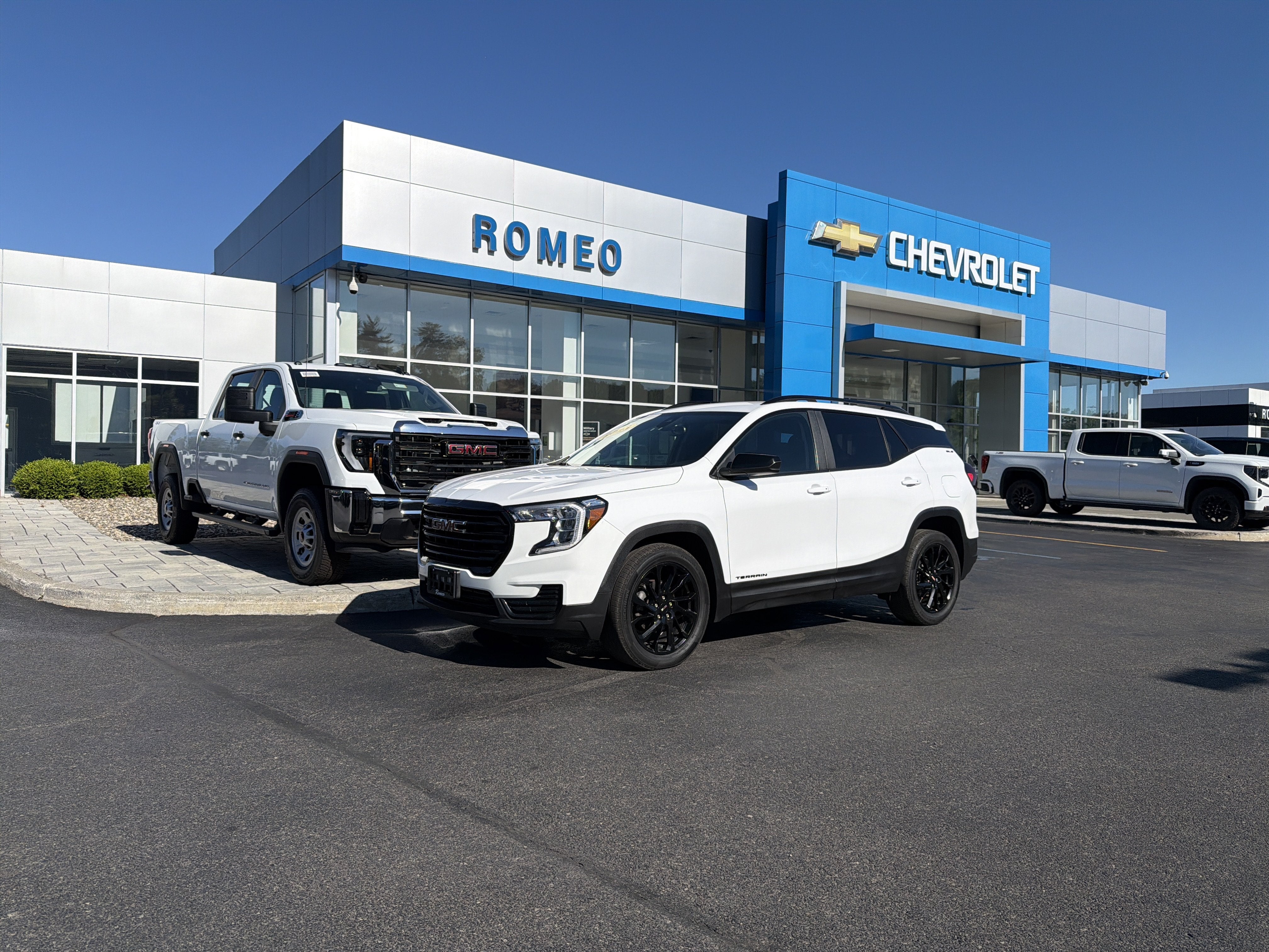2023 GMC Terrain SLE in Summit White — front three-quarter view