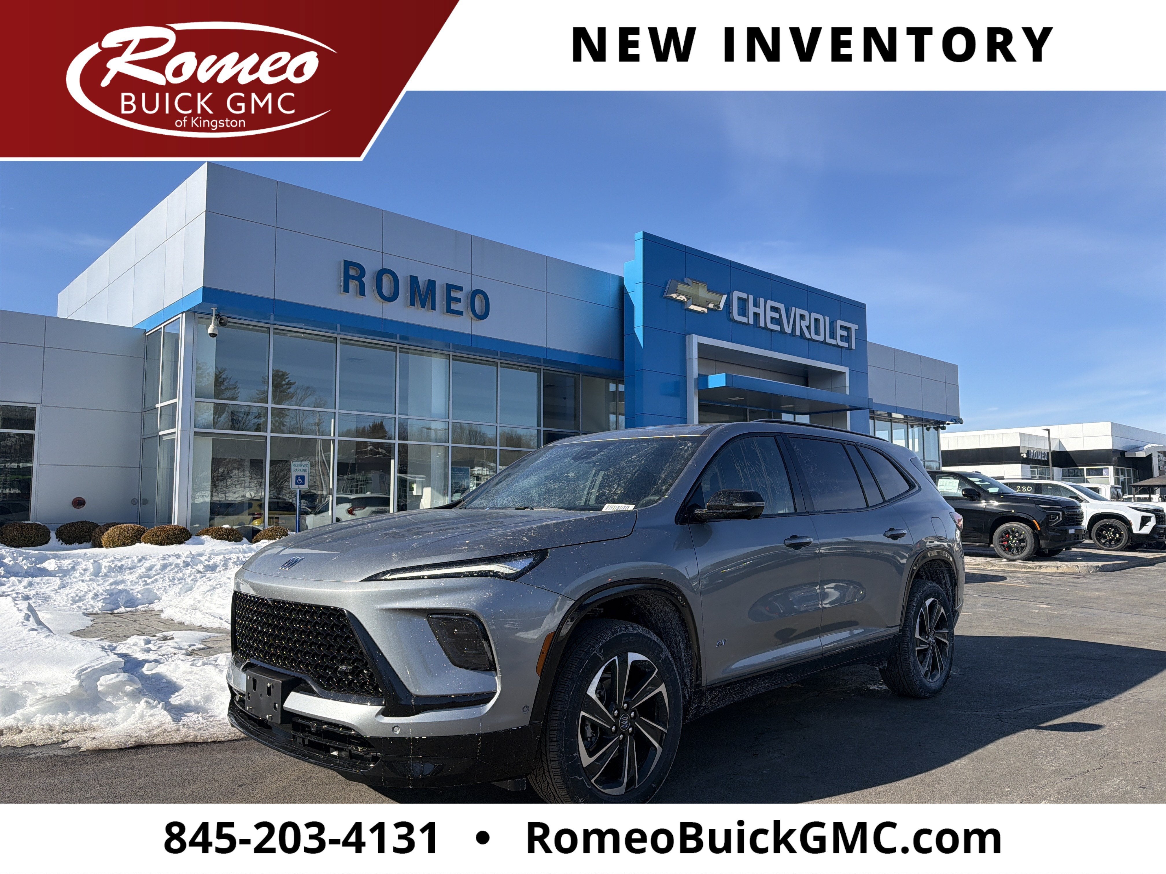 2026 Buick Enclave Sport Touring in Moonstone Gray Metallic — front three-quarter view