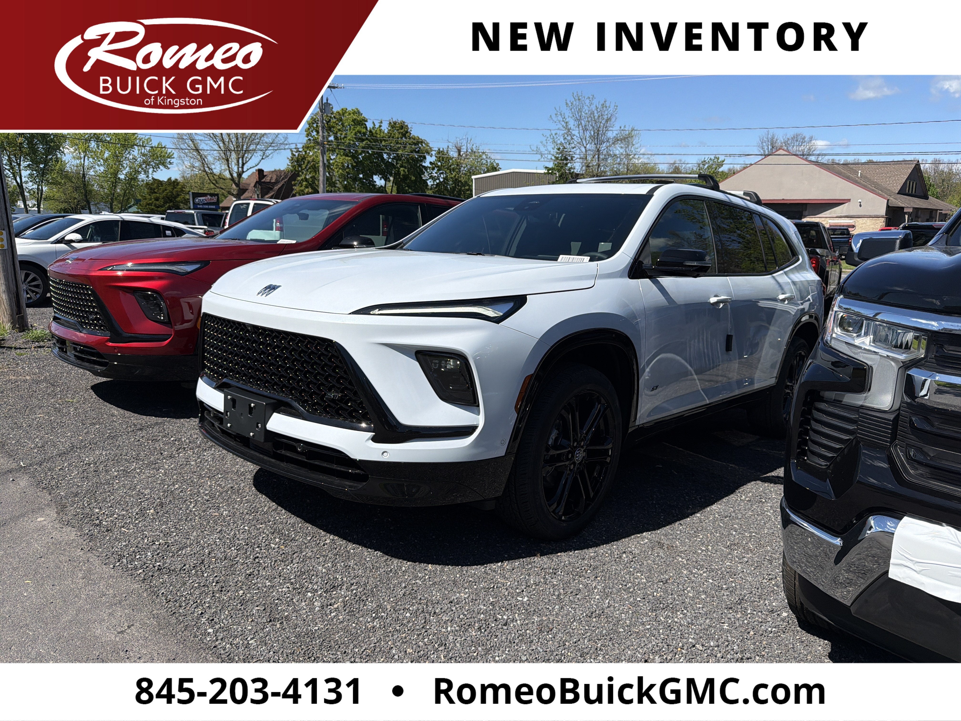 2026 Buick Enclave Sport Touring in Iridescent White Tricoat — front three-quarter view