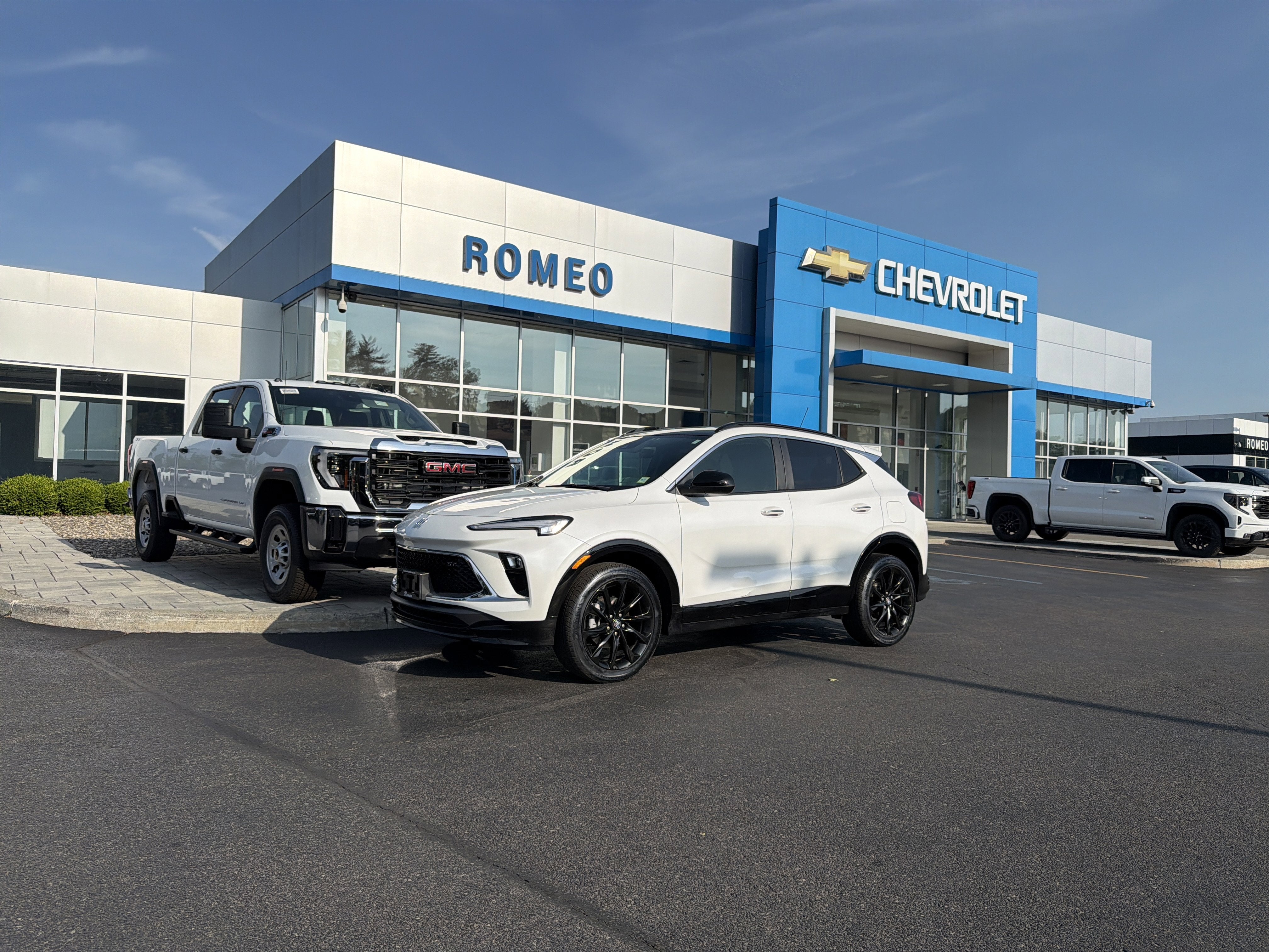 2024 Buick Encore GX Sport Touring in White Frost Tricoat — front three-quarter view