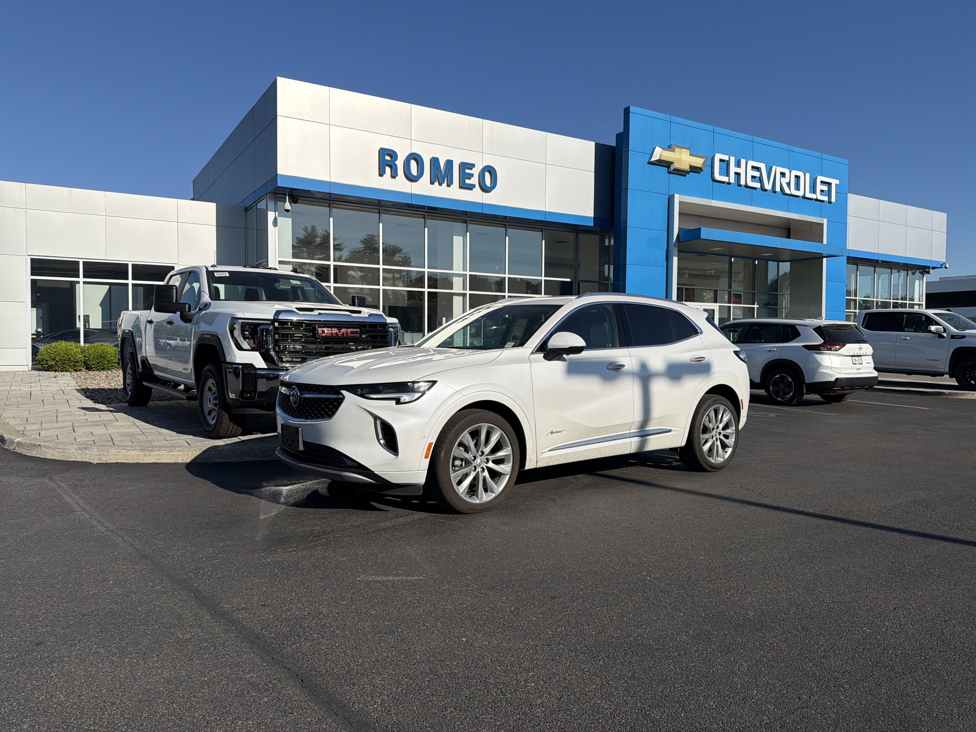 2023 Buick Envision Avenir in White Frost Tricoat — front three-quarter view